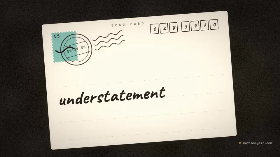 Paper & Collage style frame: the word "understatement" handwritten on a postcard with a stamp and a postmark, on a dark desk